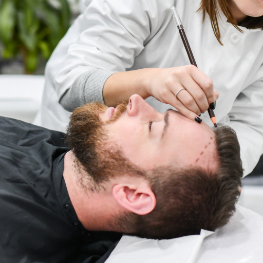 Doctor marking the hair line